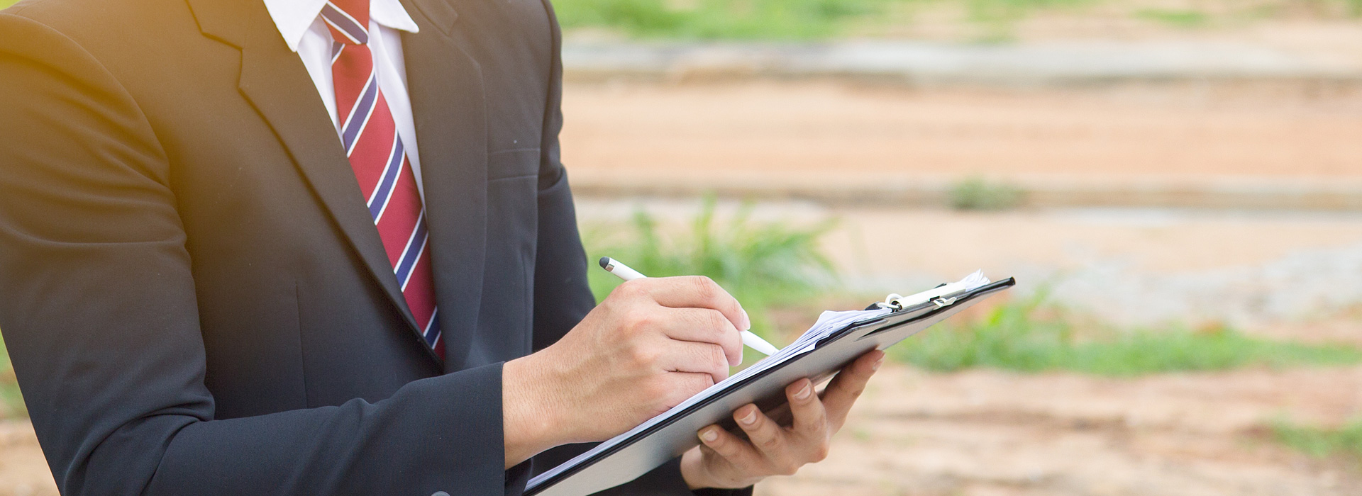 Surveyor holding a clipboard